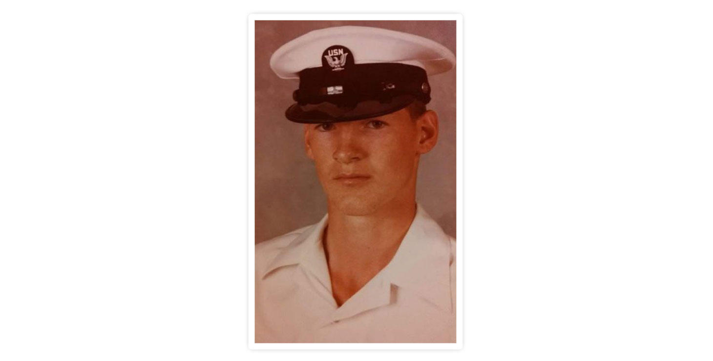 A photo of Willaim “Tom” Rogers in a Navy uniform. 